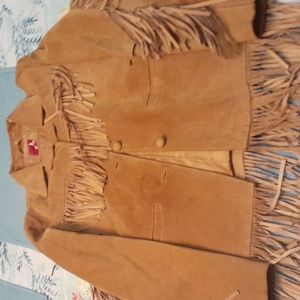 Authentic vintage Suede jacket. Gently used. Very small tear on collar.